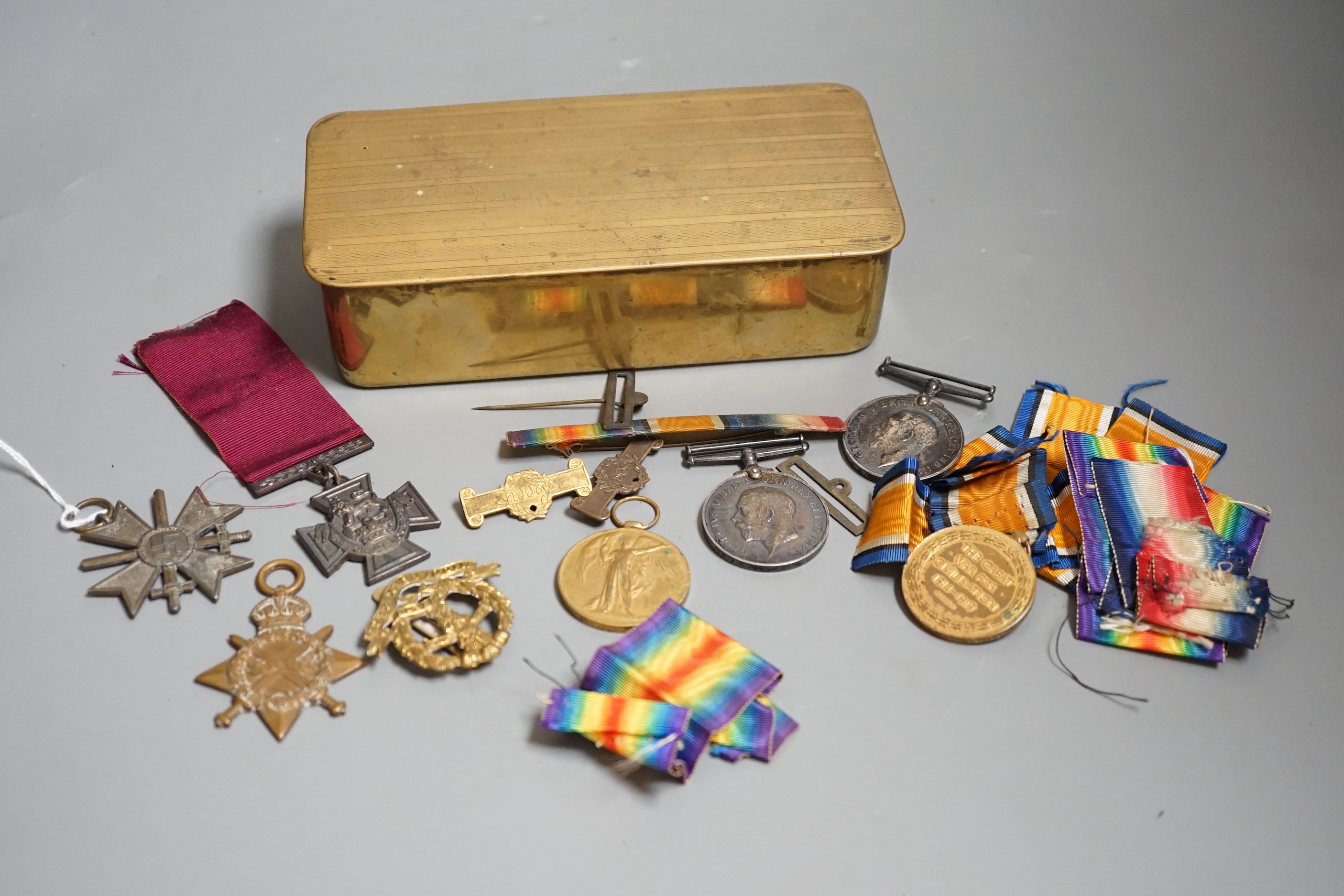 A WWI medal trio awarded to 4483 PTE. F. E. SHARP. 24 - LOND. R., an allied victory medal and matching British war medal awarded to 57292 GNR. D. KENDALL. R. A. with an honourable discharge certificate given to 5723 J. O